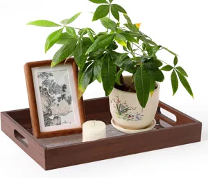 Wooden serving tray with hollow design, elegant decorative tea tray for home kitchen and table.