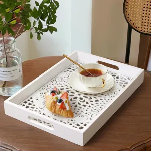 Nordic style white wooden hollow serving tray detail, elegant tea and pastry storage organizer.