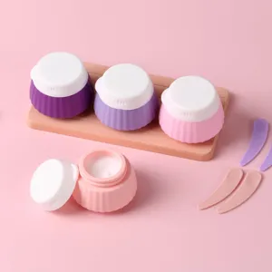 Detailed view of portable silicone travel jars with cupcake texture in pastel colors