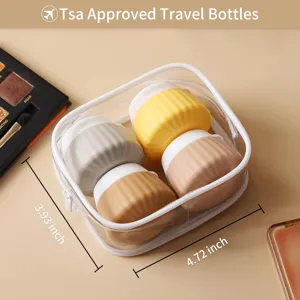 Set of portable silicone cream jars in a clear travel bag with TSA approved label