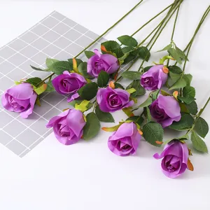 Beautiful purple artificial avalanche silk roses with green leaves for home decor