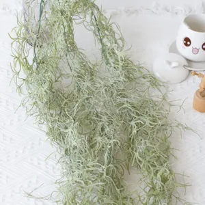 Detailed macro view of artificial hanging Spanish moss vine with realistic soft texture