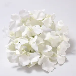 White artificial hydrangea flower head detail close up for wedding decoration and floral design.