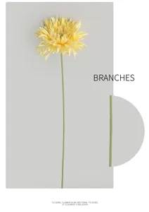 Detailed macro shot of realistic yellow gerbera daisy artificial flower stem