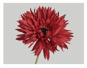 Close-up detail of a dark red artificial gerbera daisy flower head for home decoration