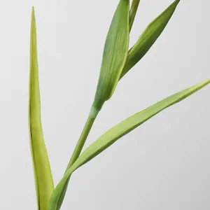 Artificial PU iris flower stem and green leaves close up view, perfect for home decor display.