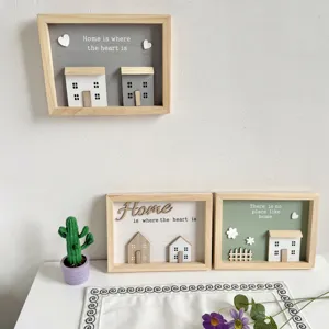 Cozy Nordic style wooden decorative frames with 3D house elements and home quotes