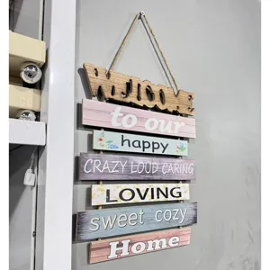 Rustic wooden welcome sign wall hanging decoration with colorful planks and inspirational text
