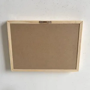 Detailed back view of a Nordic style wooden picture frame featuring a metal sawtooth hanger