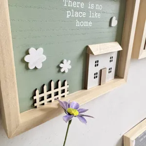 Close-up of Nordic wooden 3D wall plaque with 'no place like home' quote decoration