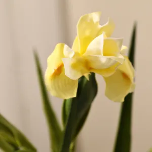 Exquisite close-up detail of yellow PU artificial iris flower for home decoration
