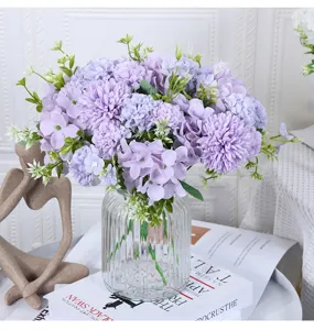 Elegant purple artificial hydrangea and dahlia flower bouquet in a ribbed glass vase