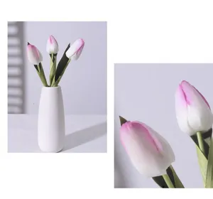 Close-up macro shot showing realistic texture of pink and white real-touch artificial tulips