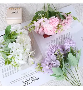 Detailed view of pink, purple, and white artificial five-fork flower bouquets