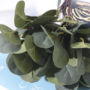Close-up detail of realistic artificial eucalyptus leaves with natural texture