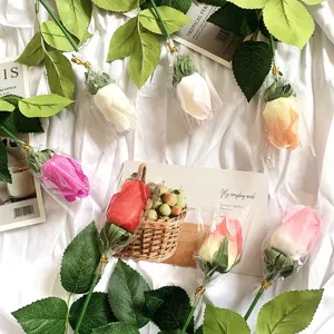 Handcrafted artificial moisturizing roses in various colors for wedding floral decorations