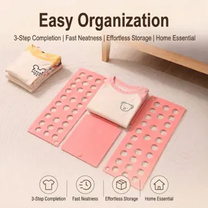 Pink portable clothes folding board for fast t-shirt and laundry organization at home