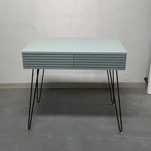 Front view of modern light blue vanity table showing two drawers and black hairpin legs