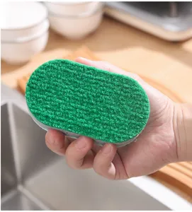 Close-up of double-sided kitchen scouring pad sponge featuring a green abrasive layer.