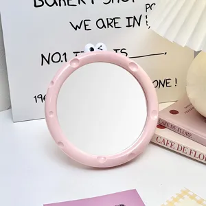 Süßer rosa Tisch-Make-up-Spiegel mit Cartoon-Augen-Design