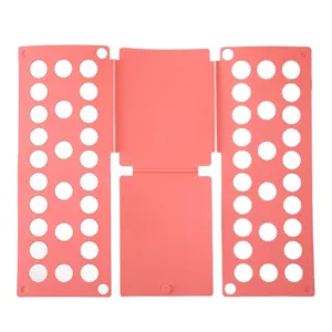 Pink plastic laundry folding board for fast shirt and clothes organization in pink color