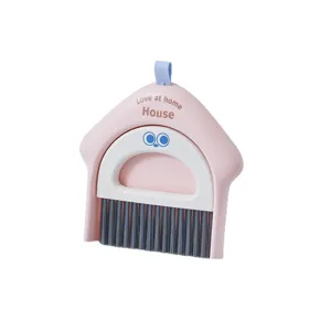 Cute house-shaped mini broom and dustpan set for desktop cleaning in pink and white