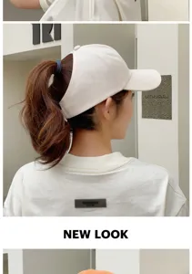 Detailed back view of a cream high ponytail baseball cap showing hair fit and design