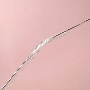 Heat-resistant reusable glass drinking straw with a flexible metal cleaning brush