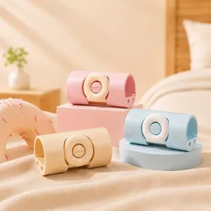 Sweet donut shaped quilt and bedsheet clips in pink, blue, and cream pastel colors.