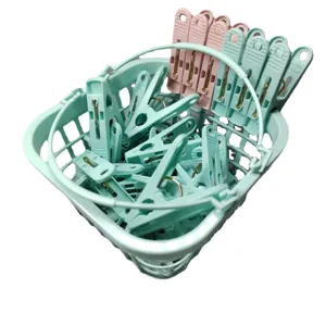 30pcs windproof plastic clothespins set with a matching storage basket and carry handle.