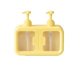 Yellow dual-compartment portable dispenser bottle with two pump heads for shampoo and soap