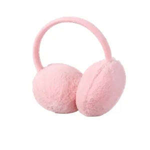 Soft pink plush earmuffs for women, warm winter ear warmers with faux fur texture