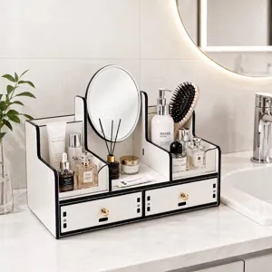 Vista detallada del organizador de maquillaje blanco con espejo y dos cajones útiles.