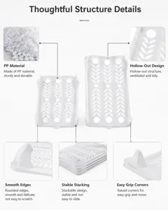 Close-up of white PP clothes folding board showing stackable design and hollow-out structure.