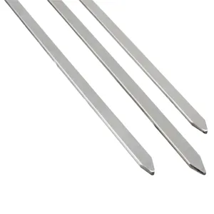 Macro detail showing the durable sharp metal tips of stainless steel BBQ skewers