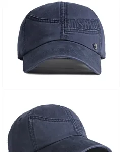 Close-up of washed cotton baseball cap with "FASHION" embroidery and metallic logo.