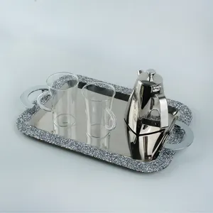Elegant stainless steel tray set with glitter border, matching teapot, and two glasses
