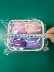 Detailed measurement showing the width of the four-piece silicone travel jar set