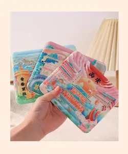 Close-up of self-heating hand warmer patches featuring traditional Chinese city art