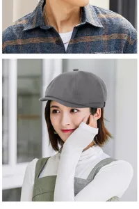 Dettaglio di un berretto newsboy grigio in cotone in stile vintage britannico su modella