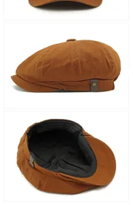 Cappello newsboy retrò in cotone marrone con vista dettagliata della fodera e del bottone.