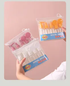 Comprehensive travel toiletry bottle set with spray and pump bottles in multiple colors