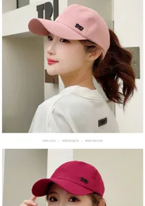Stylish women's pink baseball cap with high ponytail hole for outdoor sun protection