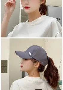 Detailed side view of a grey ponytail-friendly open-top baseball cap for women outdoor sports.