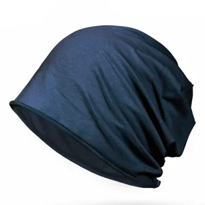 Navy blue soft cotton slouchy beanie with rolled edge for autumn and winter warmth