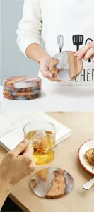 Detailed view of handmade round resin and wood coasters used with a hot glass of herbal tea