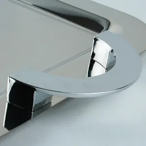 Detail view showing the polished stainless steel handle of a high-end square buffet tray