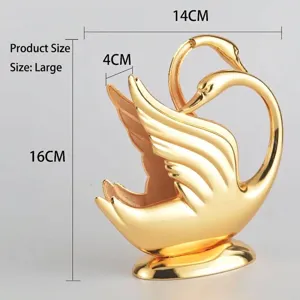 Eleganter goldener Serviettenhalter in Schwanenform aus Zinklegierung mit Maßen 16x14cm