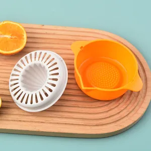 Manual plastic citrus juicer squeezer with orange collection bowl and white strainer