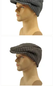Close-up detail of vintage knitted beret hat showing textured fabric and brim on mannequin